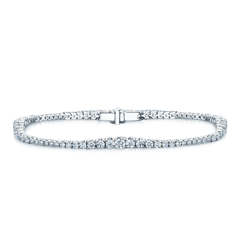 Ladies bracelets symmetrical balance styles-Ladies bracelets symmetrical balance styles-18ct White Gold Graduating Diamond Tennis Bracelet