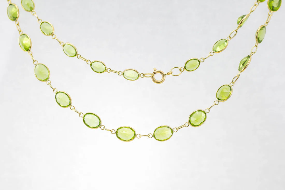 Ladies necklaces party wear glamour-9ct Yellow Gold Peridot Graduated Line Necklace