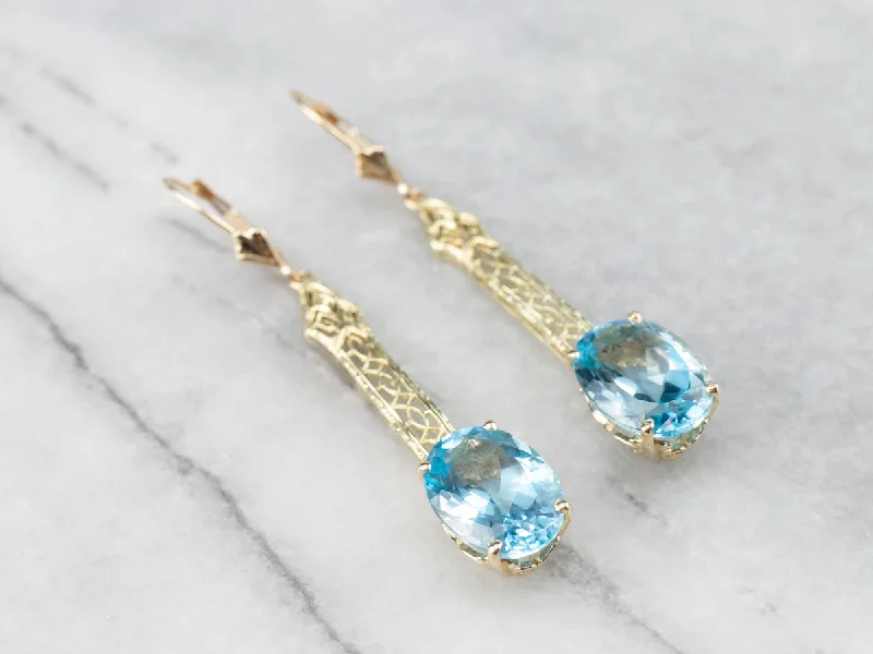 Ladies earrings nature-inspired patterns-Blue Topaz Gold Filigree Bar Drop Earrings