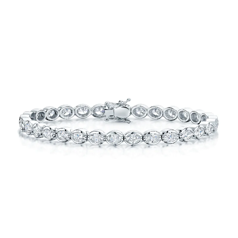 Ladies bracelets Native American styles-Ladies bracelets Native American styles-18ct White Gold Oval Cut Diamond Rub Over Set Tennis Bracelet