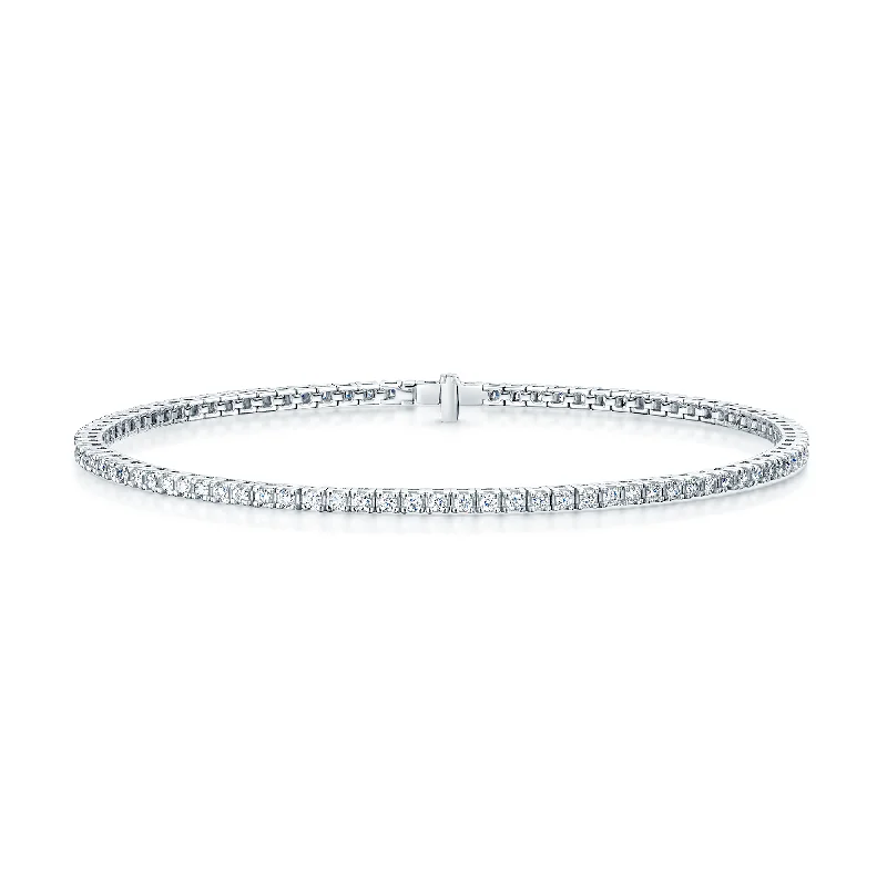 Ladies bracelets contemporary classic designs-Ladies bracelets contemporary classic designs-18ct White Gold Round Brilliant Cut Diamond Four Claw Set Tennis Bracelet