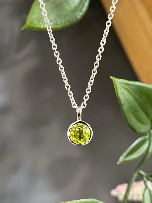 Ladies necklaces tension set pendants-Unique & Co Sterling Silver Peridot Pendant Necklace