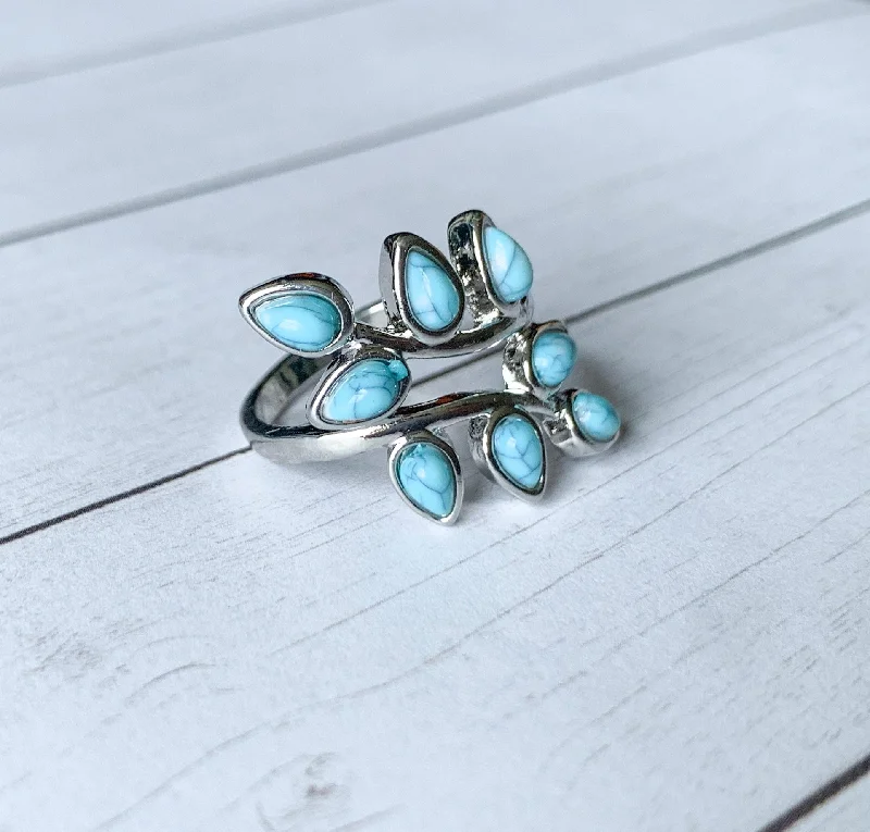 Ladies rings long-lasting designs-Gorgeous Ring with Turquoise Teardrop Shaped Stones