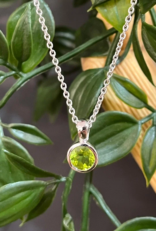 Ladies necklaces mid-century modern looks-Unique & Co Rhodium Plated Silver Peridot Necklace