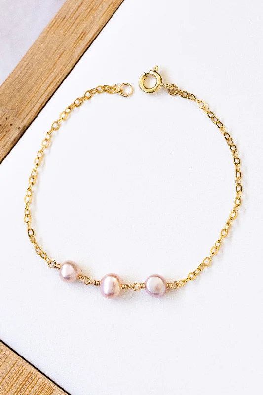 Ladies bracelets impressionist vibe bracelets-Ladies bracelets impressionist vibe bracelets-Triple Flat Pink Pearl Bracelet