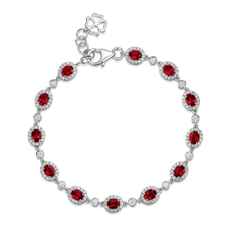 Ladies bracelets hypoallergenic materials-Ladies bracelets hypoallergenic materials-18ct White Gold Oval Ruby And Diamond Halo Bracelet